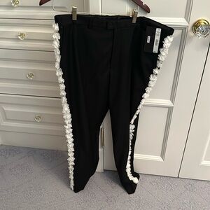 Anti black pants with white flowers on the side